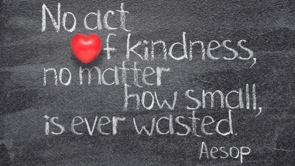 Chalkboard with the quote "No act of kindness, no matter how small, is ever wasted" by Aesop, featuring a red heart, symbolizing kindness and its impact on the world.